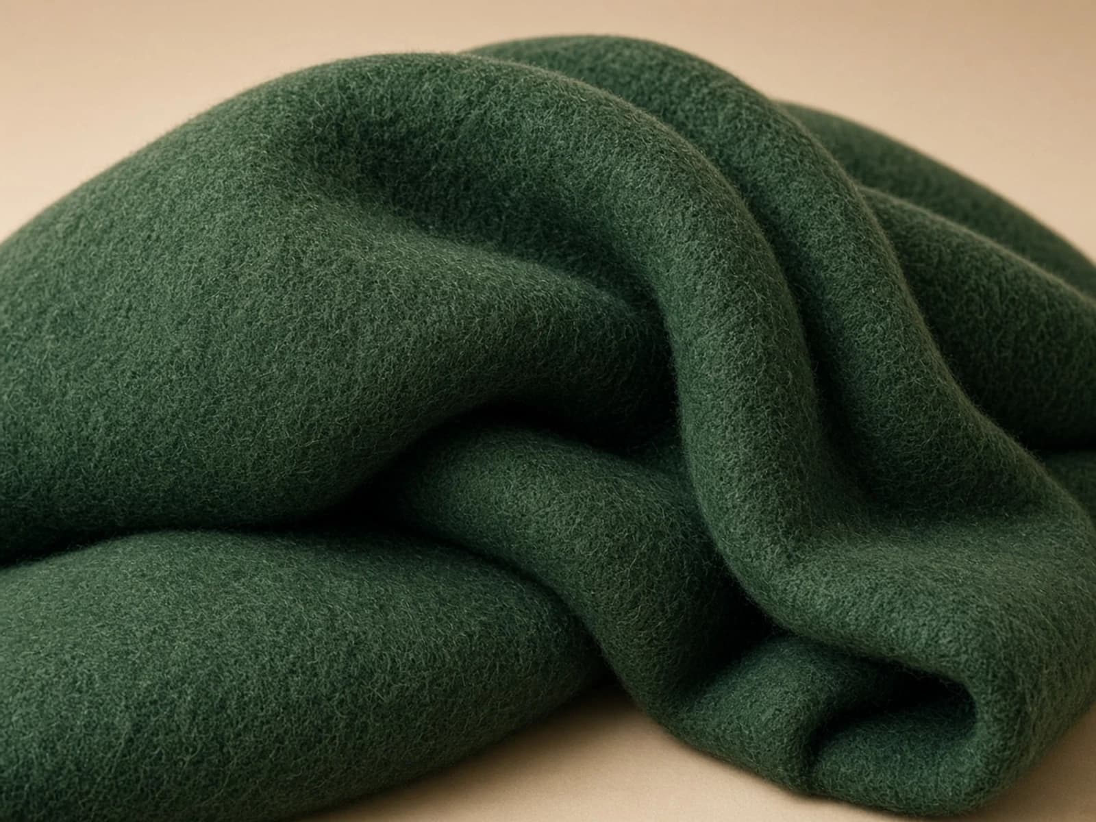 Boiled wool with a dense felted fiber surface and stable body