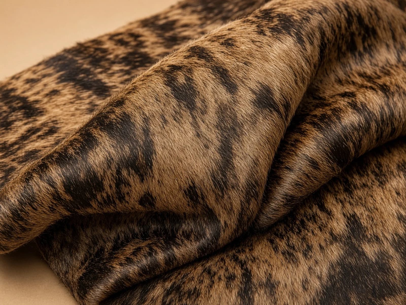 Calf-hair finish leather with a short natural directional hair coat