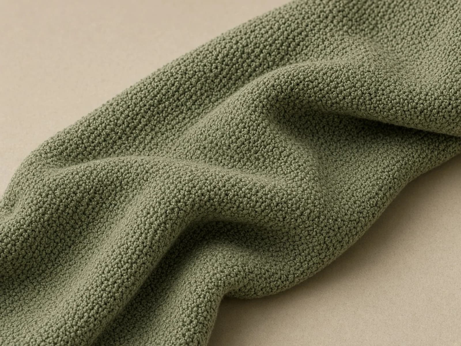 Cotton bouclé knit with a matte looped staple-fiber surface