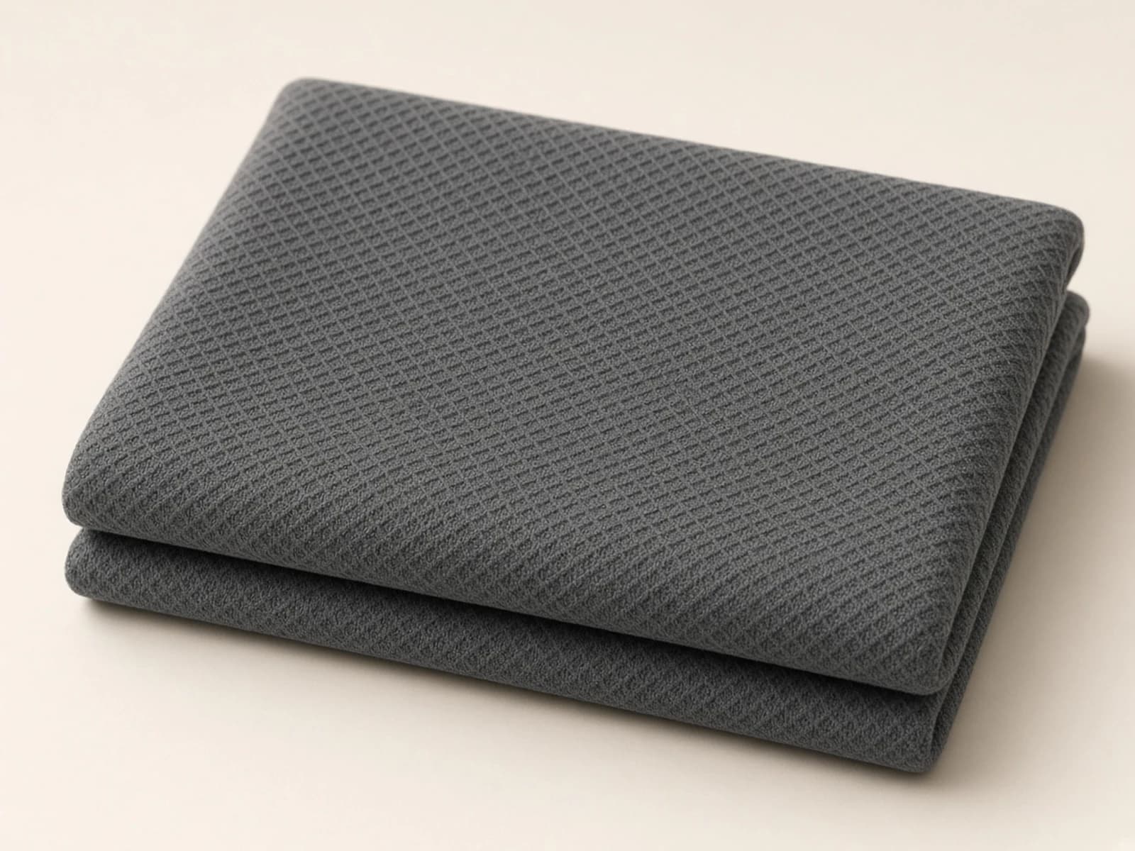 Charcoal cotton-rich piqué with a dimensional geometric knit