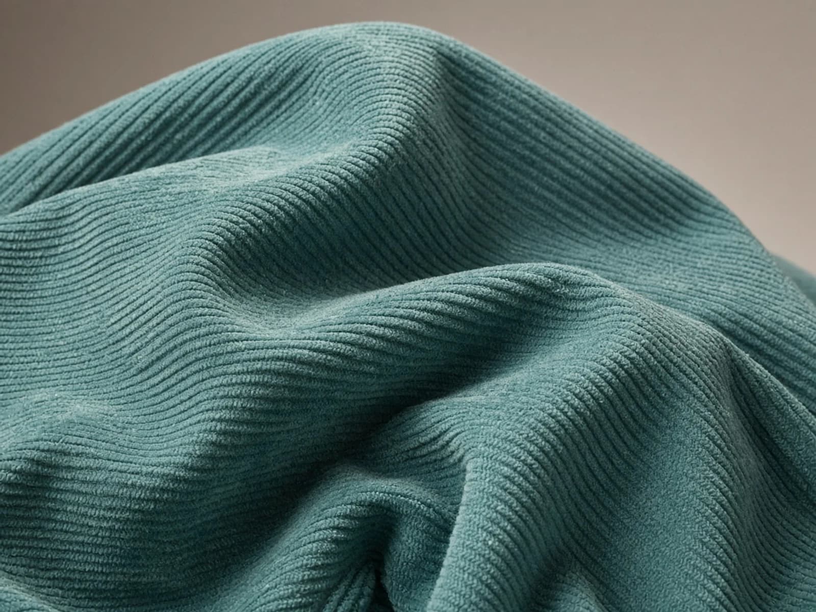 Fine-wale corduroy with many narrow raised cotton pile ribs