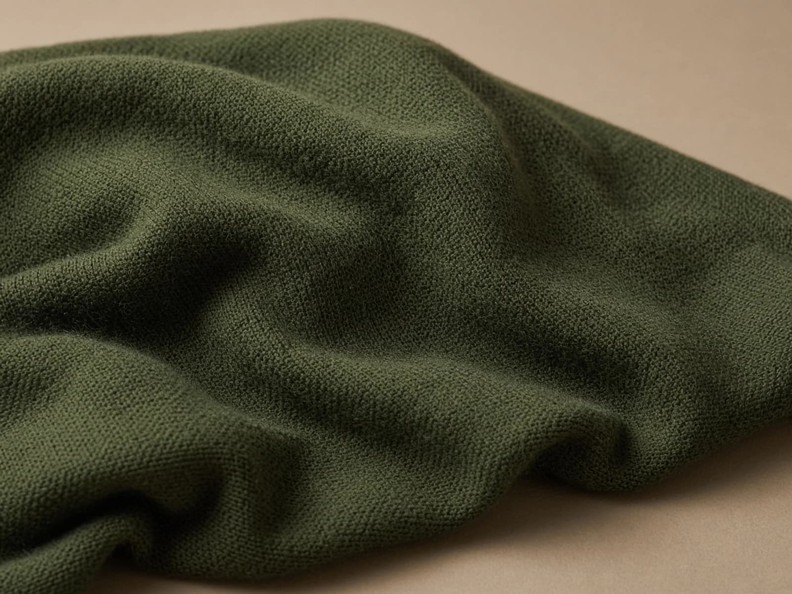 Lightweight merino knit with fine loops and a soft natural wool halo