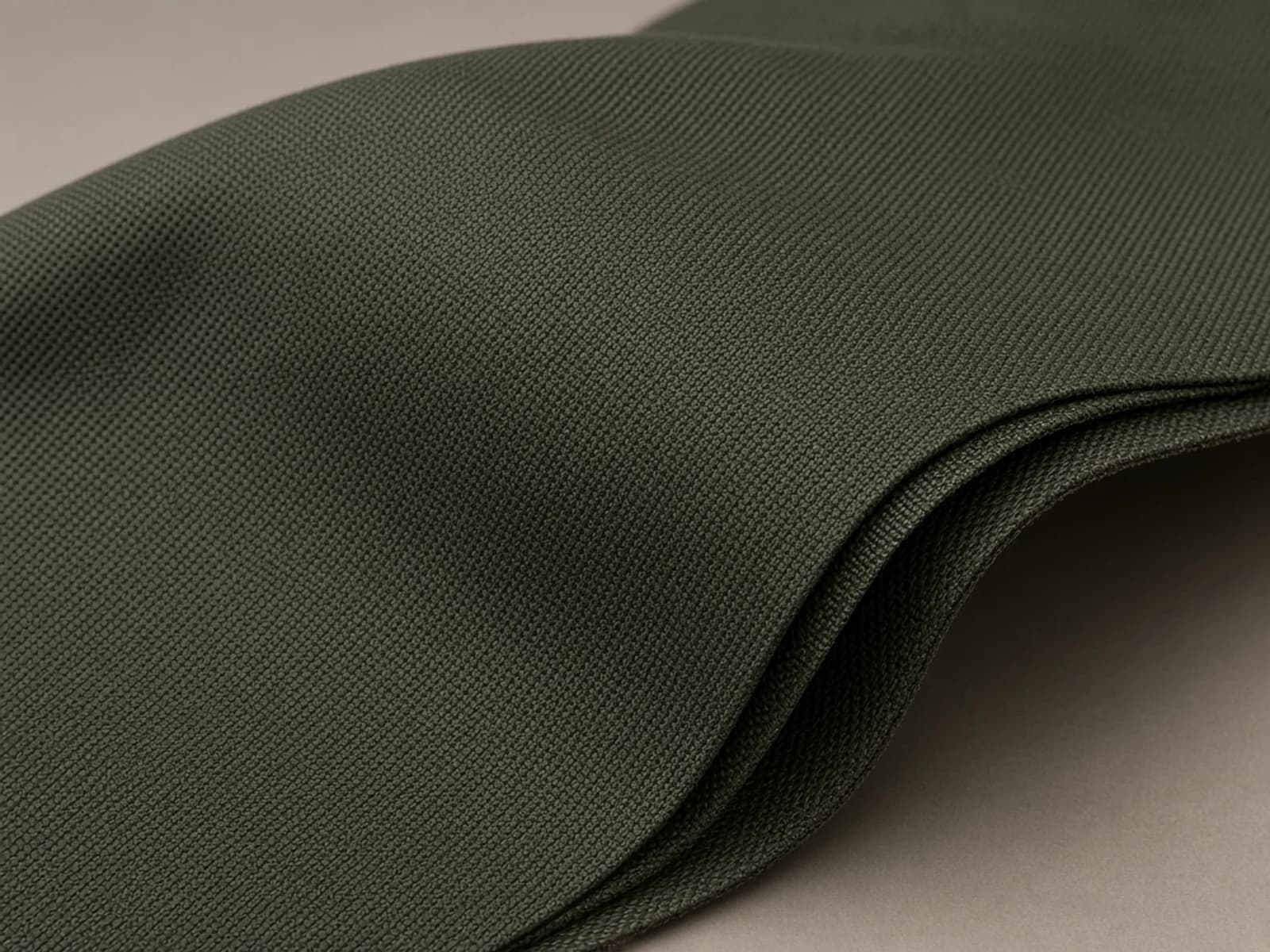 Membrane-backed gabardine with dense diagonal technical twill