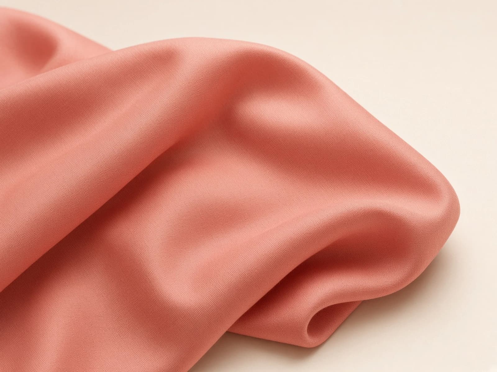 Coral mercerised cotton lawn with a clean fine plain weave