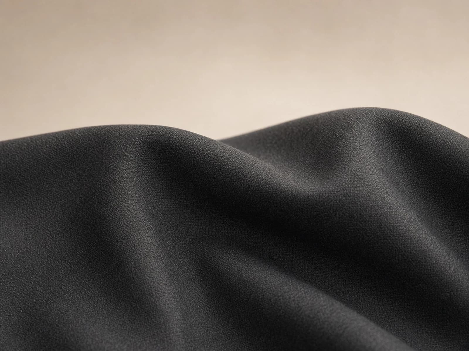Fine merino tailoring cloth with a compact structured stretch weave