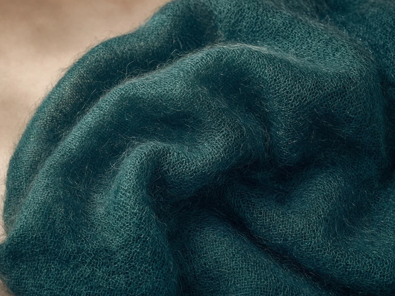 Mohair blend with an airy woven surface and visible long fiber halo