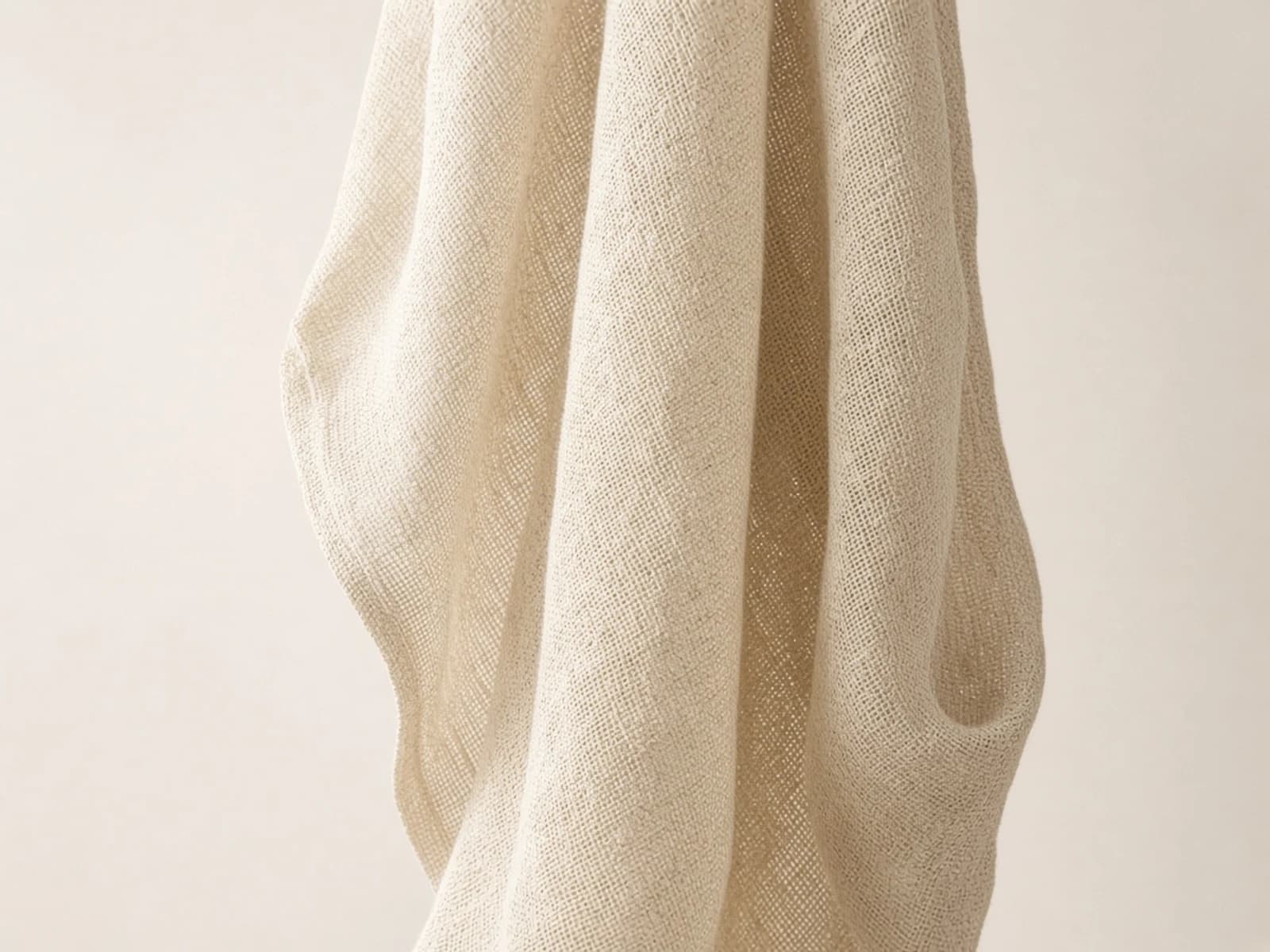 Open-weave ecru linen curtain fabric with airy yarn spacing
