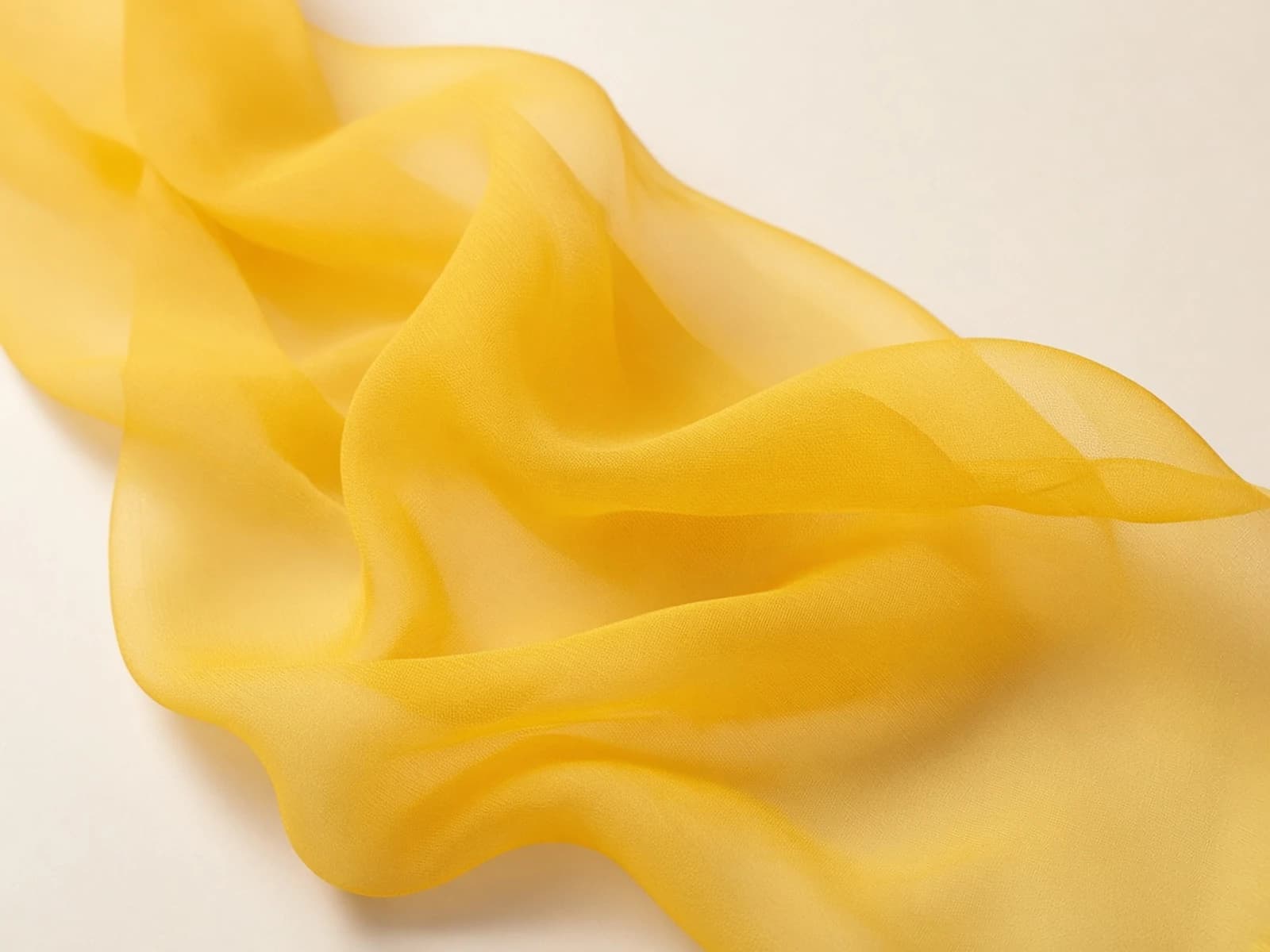 Marigold polyester chiffon with lightweight transparent folds