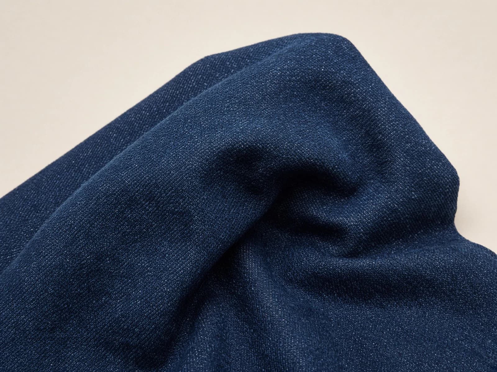 Dense dark indigo premium-weight denim with pronounced twill