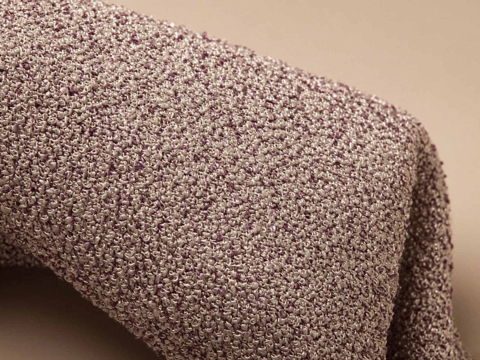 Silk bouclé with dense irregular looped yarns and a subtle tonal sheen