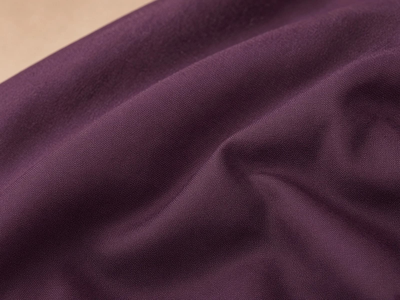 Deep plum silk taffeta with structured reflective folds