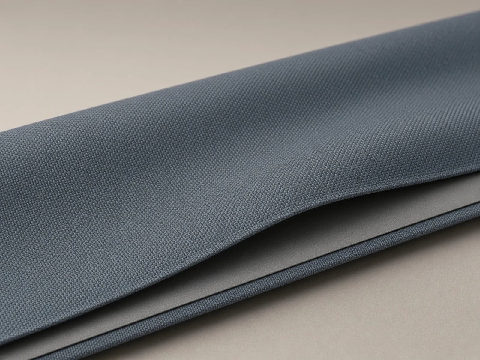 Two-layer membrane laminate with a face fabric and continuous membrane